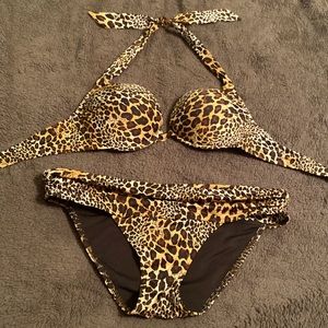Victoria’s Secret animal print swimsuit. Bottoms are a medium and top is 36B.